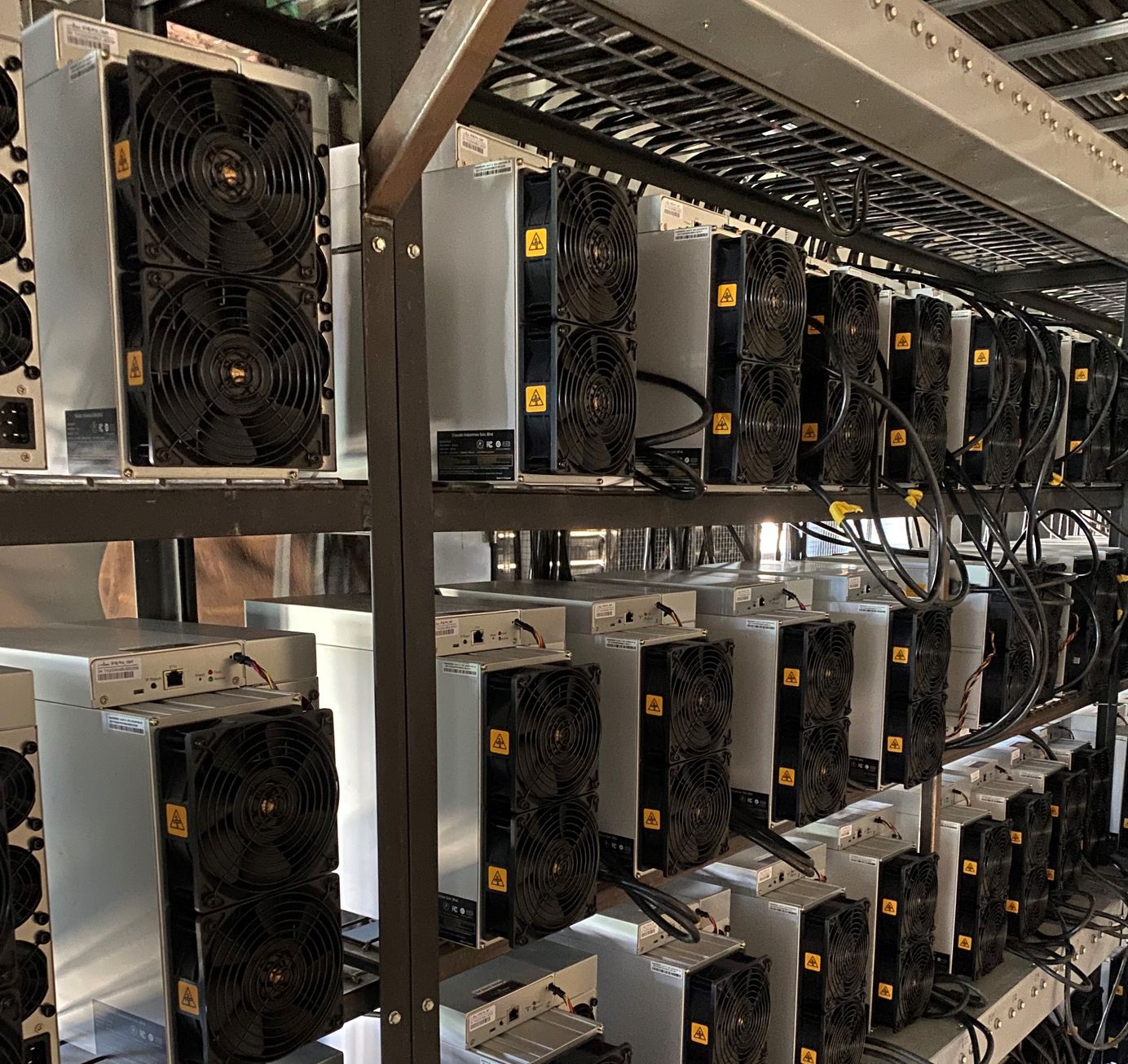 A rack of S19j Pro miners